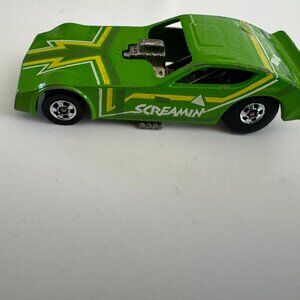 Lot 057 – Hot Wheels/Small Toys.  Sold As Is.  Green Car